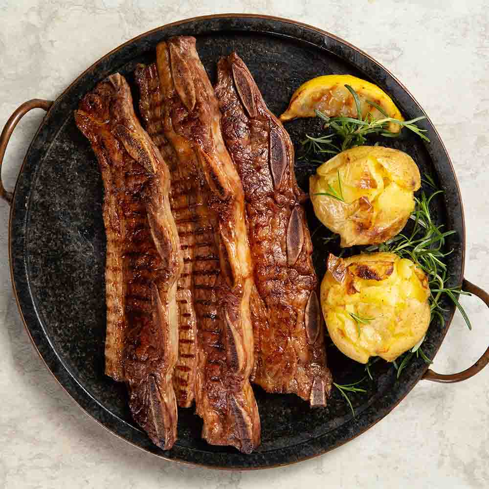 Receita de Assado de tiras Gran Reserva com batata ao murro